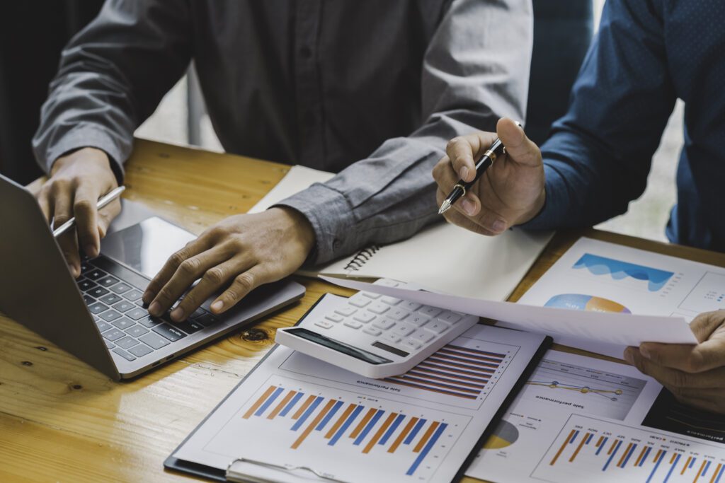 Businessman Calculating Funds For New Business