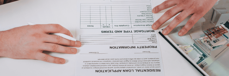 financial broker guiding borrowers on how to refinance debt with bad credit