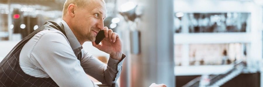 Man applying for a loan over the phone | Financial Information | Tiger Finance