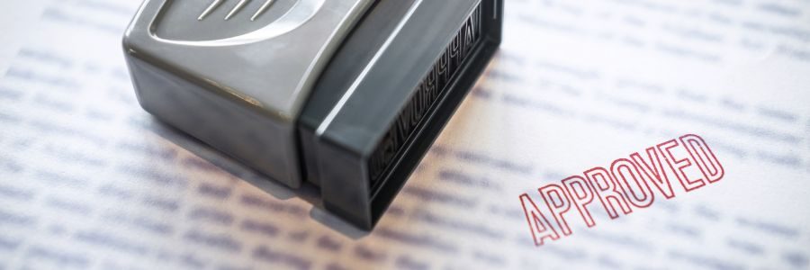 close-up-stamp-on-paper-document-to-approve-busine-caveat-.loans-tiger-finance