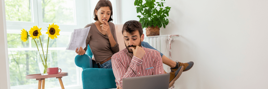 couple-paying-bank-loans-caveat-loans-tiger-finance