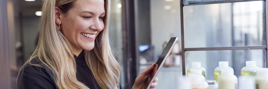 Happy woman expanding her small business | Financial Information | Tiger Finance