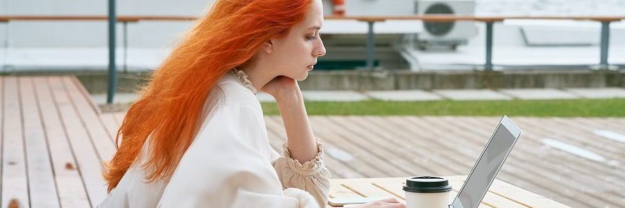 Girth sitting outside checking her credit score | Financial Information | Tiger Finance