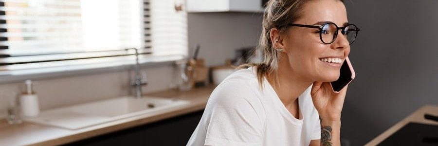 Woman smiling applying online for a mortgage | Financial Information | Tiger Finance