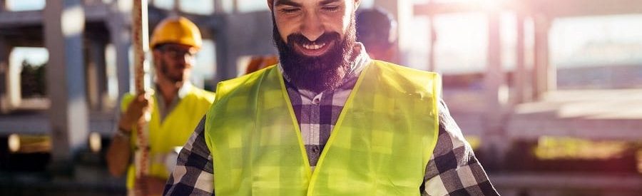 Smiling builder on a development | Financial Information | Development Loans