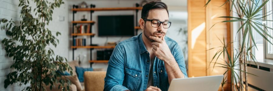 portrait-of-a-casual-businessman-thinking-while-lo-tiger-finance-caveat-loans