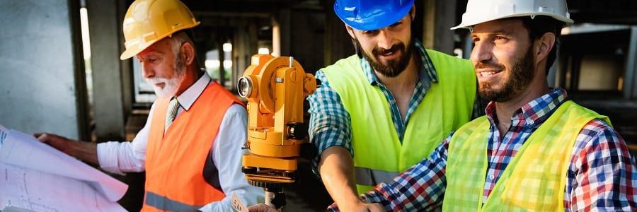 Development engineers talking at a building site | Financial Information | Tiger Finance
