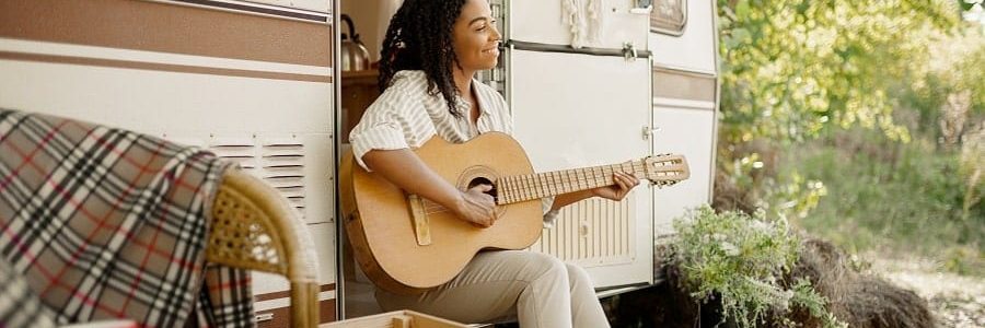 Woman enjoying her new caravan | Financial Information | Tiger Finance