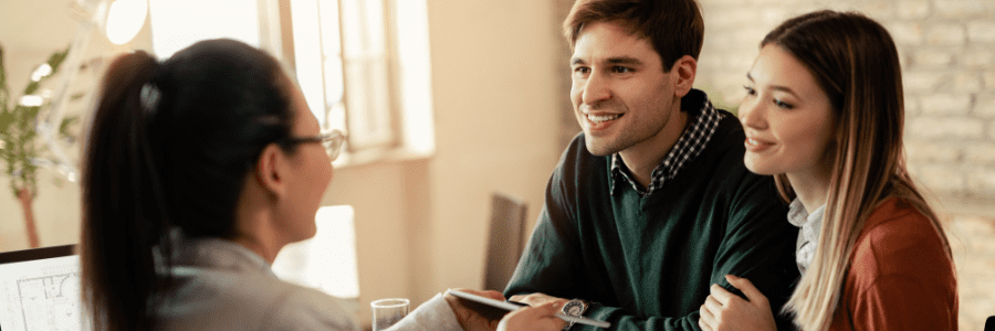 young couple having a meeting with Tiger Finance loan advisor